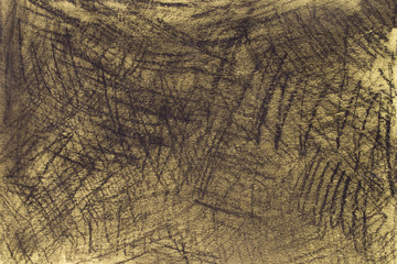 black pastel crayon on yellow paper background