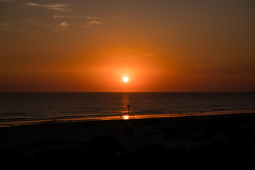 Sunset at La Barrosa beach in Sancti Petri, Cadiz, Spain