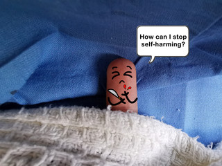 One finger is decorated as one person. The person is having self harm behaviour.