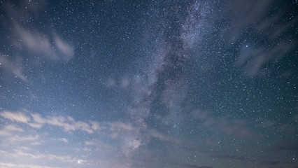 Beautiful starry sky with bright milky way galaxy. Night landscape. Astronomical background.