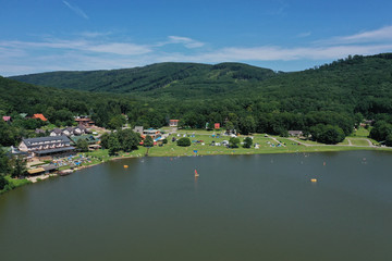 Fototapeta premium Aerial view of a lake in the village of Vinne in Slovakia