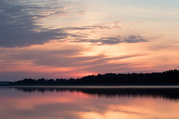 Fototapeta na wymiar Summer sunset by the lake