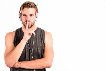 Audio quality. Modern earphones. Online music services. Inspiring music concept. Man handsome unshaven hipster listening music using headphones gadget. Listen music for motivation and inspiration