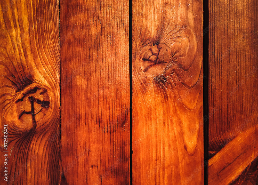 Wall mural Texture of brown natural wood up close.