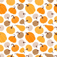 Seamless autumn pattern with different multicolored pumpkins on a white background.
