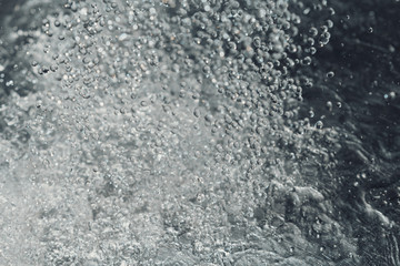 Water drops in motion ,close up. Blur effect