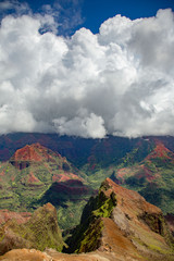 Waimea Canyon, also known as the Grand Canyon of the Pacific, is a large canyon, approximately ten miles long and up to 3,000 feet deep, located on the western side of Kauai, Hawaii