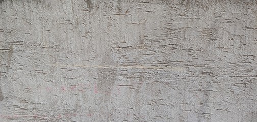 Rough gray wall with roller marks_background