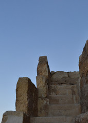The golden sandstone of the Great Pyramid of Giza, Egypt, and the blue sky