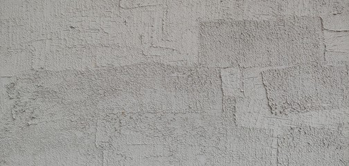 a grey wall with clear brush marks_background