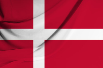 The national flag of Denmark on fabric texture background. Flag image for design on flyers, advertising.