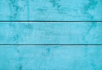 Blue plastered wall with old paint and stripes. Vintage background.