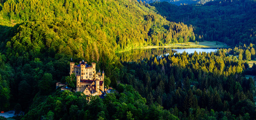 Hohenschwangau Castle is a 19th-century palace in southern Germany. It was the childhood residence of King Ludwig II of Bavaria. - obrazy, fototapety, plakaty