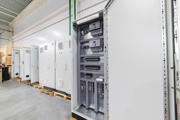 Industrial production of an electricity panel boards - several boards standing one by one