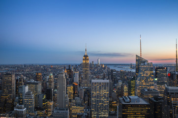 Fototapeta na wymiar New York skyline at sunset with city lights