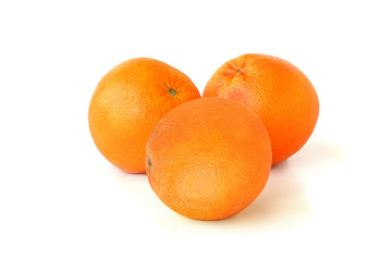 Three oranges isolated on white