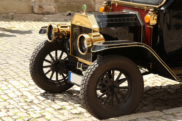 Beautiful retro car stands on the street