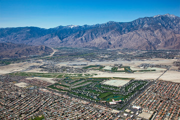 Aerial view of Palm Springs, California with the snow dusted San Jacinto Mountains as a backdrop