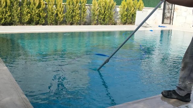 The cleaner who cleans the pool. The cleaner who cleans the pool floor.