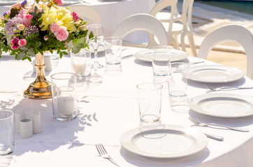 set table with empty dishes and clean glasses
