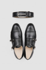 Male classic shoes. Elegant black monk shoes