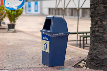blue garbage bin