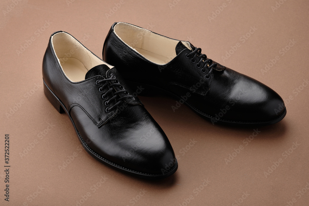 Wall mural male shoes. derby. men's fashion leather shoes