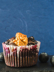 Homemade blueberry muffins in natural light.