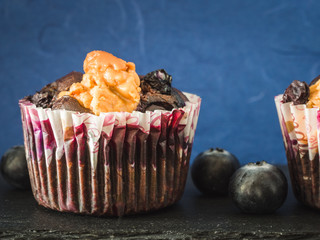 Homemade blueberry muffins in natural light.
