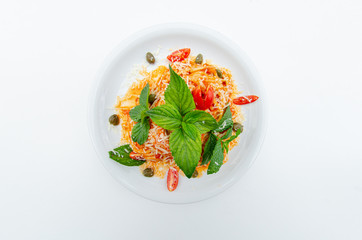 spaghetti with vegetables and cheese top view