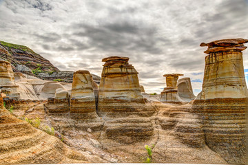 Landscapes and terrain around the hoodoos rock formations outside of Drumheller Alberta - obrazy, fototapety, plakaty