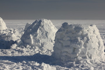 A house of snow. Dwelling of the Eskimos. Igloo.