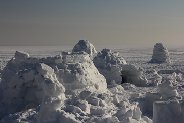 A house of snow. Dwelling of the Eskimos. Igloo.