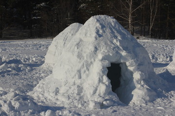 A house of snow. Dwelling of the Eskimos. Igloo.