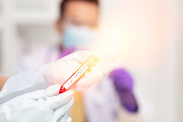 Science people hold negative result of blodd from Corona virus diagnostic result