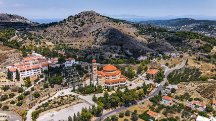 Fototapeta na wymiar Aerial drone view of Saint Nektarios church on Aegina island, Greece