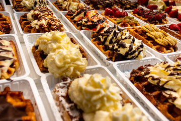Waffle selection through a window in Brussels, Belgium. 