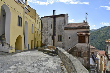 A narrow street among the old houses of Tortora, a rural village in the Calabria region, Italy.