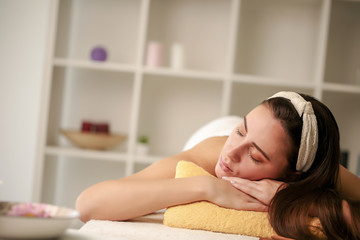 Obraz na płótnie Canvas massage therapy. enjoying a massage in the spa