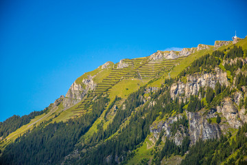 Obraz premium Snow fence that protects skiers on the steep mountain slopes just below Mannlichen, Switzerland