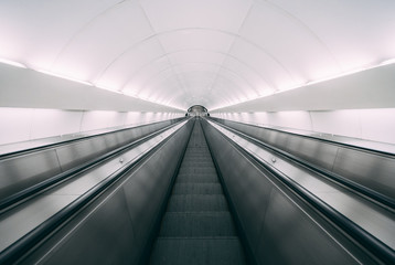 moving escalator in subway - obrazy, fototapety, plakaty