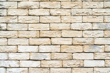 Yellow brick building wall. Interior of a modern loft. Background for design and interview recording.