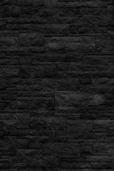 Black brick building wall. Interior of a modern loft. Background for design