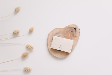 Handmade natural organic soap isolated on white. Spa procedure, healthy lifestyle. Eco cosmetics. Top view, copyspace