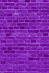 Fototapeta na wymiar Violet brick building wall. Interior of a modern loft. Background for design