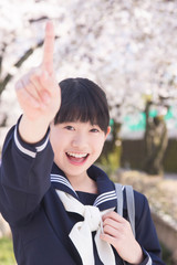 指差す女子中学生