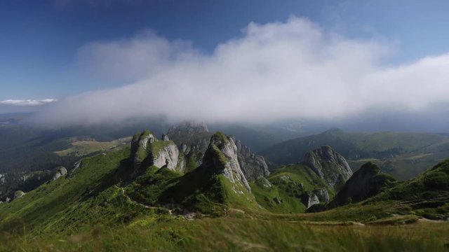 4K time lapse of fog moving over Ciucas rock mountains in Romania.
