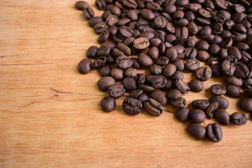Coffee beans on wooden background. Copy space. 