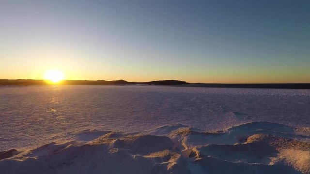A sun set on Lake Superior in Winter 