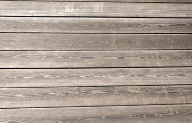 Obraz premium The background is made of grey wooden planks.